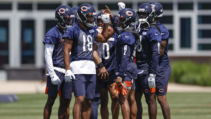Jun 9, 2021; Lake Forest, Illinois, USA; Chicago Bears wide receivers huddle on the field during organized team activities at Halas Hall. Mandatory Credit: Kamil Krzaczynski-Imagn Images