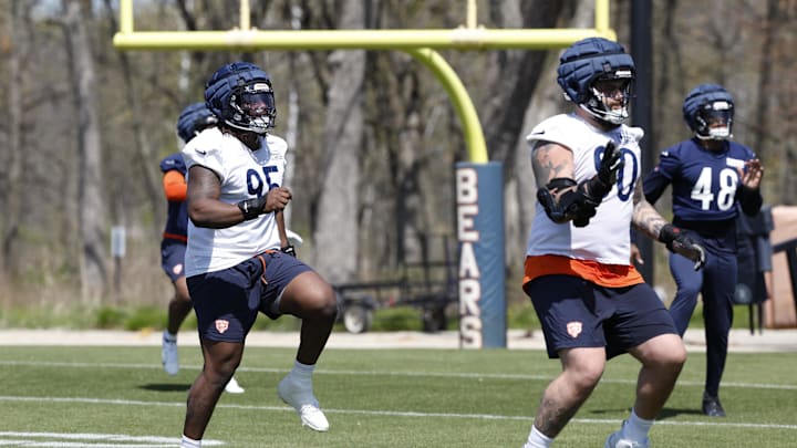 May 9, 2025; Lake Forest, IL, USA; Chicago Bears defensive line Shemar Turner (95) warms up during the Rookie Minicamp at Halas Hall. Mandatory Credit: Kamil Krzaczynski-Imagn Images