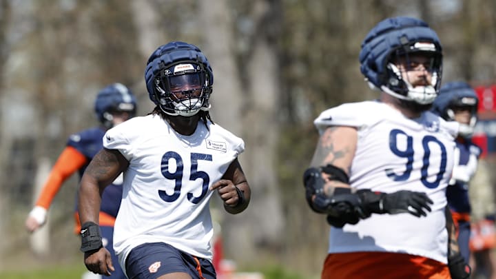 May 9, 2025; Lake Forest, IL, USA; Chicago Bears defensive line Shemar Turner (95) warms up during the Rookie Minicamp at Halas Hall. Mandatory Credit: Kamil Krzaczynski-Imagn Images