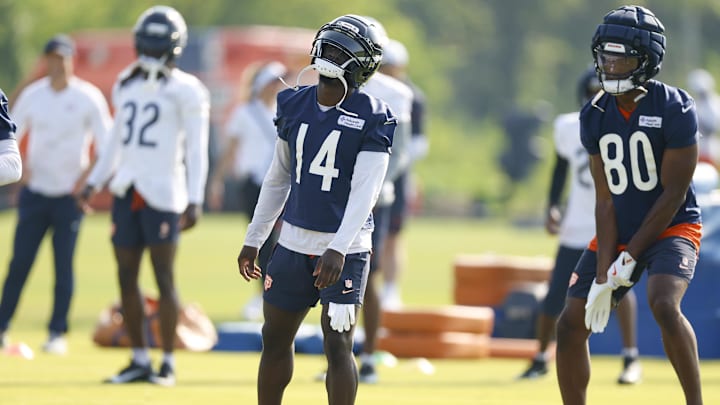 Jul 23, 2025; Lake Forest, IL, USA; Chicago Bears wide receiver Olamide Zaccheaus (14) reacts during training camp at Halas Hall. Mandatory Credit: Kamil Krzaczynski-Imagn Images