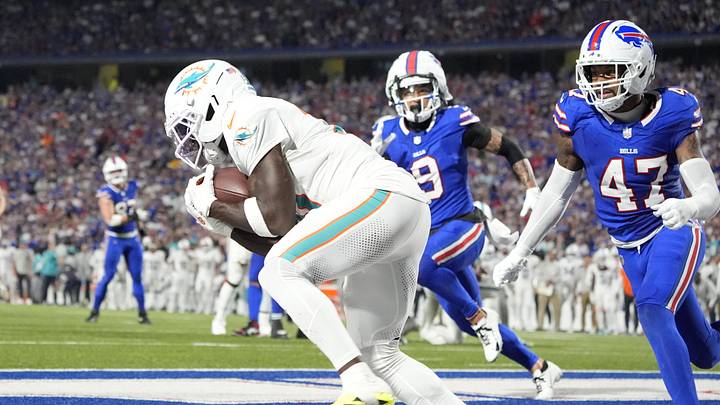 Sep 18, 2025; Orchard Park, New York, USA;  Miami Dolphins wide receiver Tyreek Hill (10) makes a catch to score a touchdown against the Buffalo Bills in the fourth quarter at Highmark Stadium. Mandatory Credit: Gregory Fisher-Imagn Images