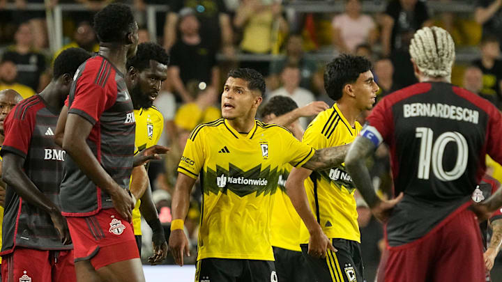 Columbus Crew forward Cucho Hernandez (9) gets into an arguement with Toronto FC forward Deandre Kerr (29) during the second half of the MLS 
