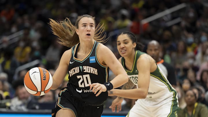 May 29, 2022; Seattle, Washington, USA; New York Liberty guard Sabrina Ionescu (20) dribbles past