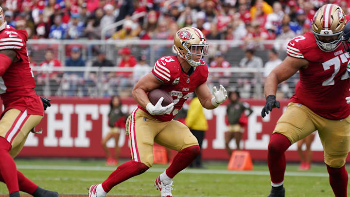 Nov 17, 2024; Santa Clara, California, USA; San Francisco 49ers running back Christian McCaffrey (23) rushes the ball against the Seattle Seahawks in the second quarter at Levi's Stadium. Mandatory Credit: David Gonzales-Imagn Images