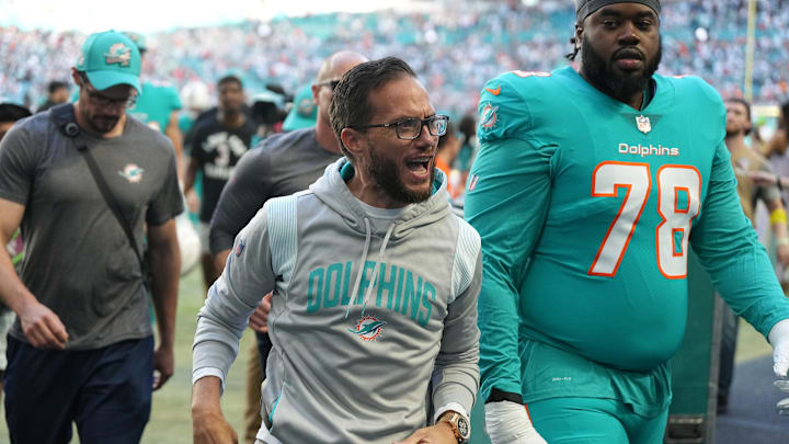 Miami Dolphins head coach Mike McDaniel is all smiles as he leaves the field after an 11-6 victory over the New York Jets at Hard Rock Stadium in Miami Gardens, Jan. 8, 2023. Miami Dolphins head coach Mike McDaniel is all smiles as he leaves the field after an 11-6 victory over the New York Jets at Hard Rock Stadium in Miami Gardens, Jan. 8, 2023.