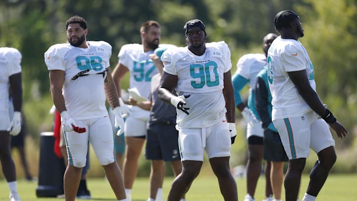 Miami Dolphins defensive tackle Kenneth Grant (90) warms up during joint training camp practice with the Chicago Bears ahead of Sunday's preseason opener. Miami Dolphins defensive tackle Kenneth Grant (90) warms up during joint training camp practice with the Chicago Bears ahead of Sunday's preseason opener.