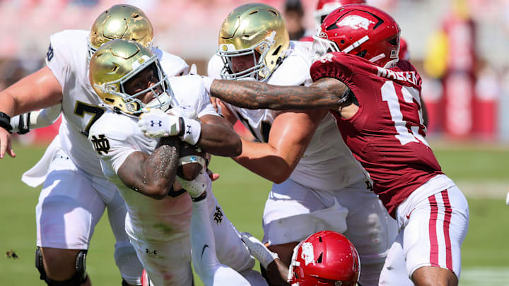 Notre Dame Fighting Irish wide receiver Malachi Fields (0) dives forward during the third quarter against the Arkansas Razorbacks at Donald W. Reynolds Razorback Stadium. Notre Dame won 56-13. Notre Dame Fighting Irish wide receiver Malachi Fields (0) dives forward during the third quarter against the Arkansas Razorbacks at Donald W. Reynolds Razorback Stadium. Notre Dame won 56-13.