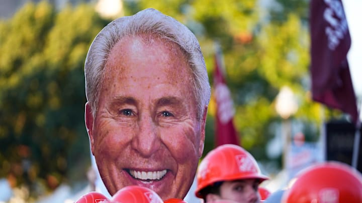 Fans hold signs in support of Lee Corso on the set of ESPN College GameDay prior to the football game between Ohio State and Texas.