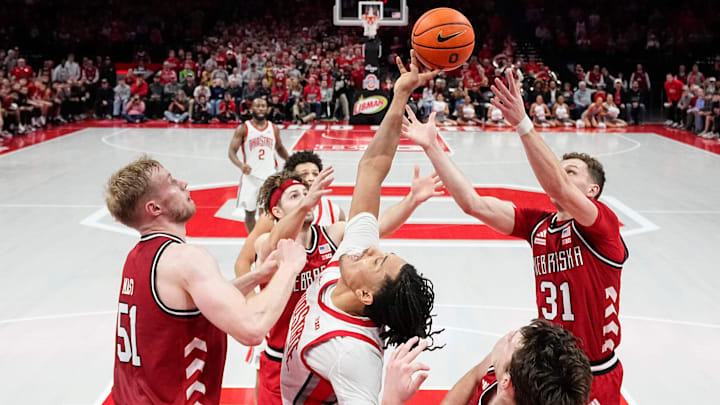 Nebraska's Rienk Mast (left) and Cale Jacobsen (31) battle for a rebound against Ohio State on Monday night in Columbus.