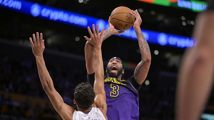 Nov 21, 2024; Los Angeles, California, USA; Orlando Magic forward Tristan da Silva (23) defends a shot by Los Angeles Lakers forward Anthony Davis (3) in the second half at Crypto.com Arena. Mandatory Credit: Jayne Kamin-Oncea-Imagn Images