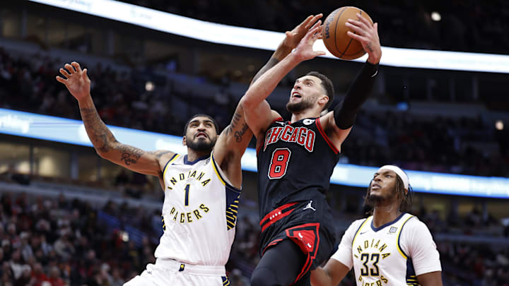 Dec 6, 2024; Chicago, Illinois, USA; Chicago Bulls guard Zach LaVine (8) goes to the basket against Indiana Pacers forward Obi Toppin (1) during the second half at United Center. Mandatory Credit: Kamil Krzaczynski-Imagn Images Dec 6, 2024; Chicago, Illinois, USA; Chicago Bulls guard Zach LaVine (8) goes to the basket against Indiana Pacers forward Obi Toppin (1) during the second half at United Center. Mandatory Credit: Kamil Krzaczynski-Imagn Images