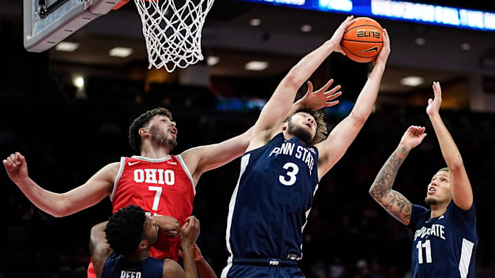 Penn State Nittany Lions forward Ivan Juric (3) grabs a rebound away from Ohio State Buckeyes center Ivan Njegovan (7) during the second half of the NCAA men's basketball game at the Schottenstein Center.