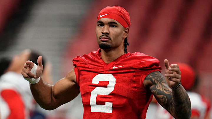 Ohio State Buckeyes wide receiver Emeka Egbuka (2) stretches during practice for the College Football Playoff against the Notre Dame Fighting Irish at the Mercedes-Benz Stadium in Atlanta on Jan. 18, 2025.
