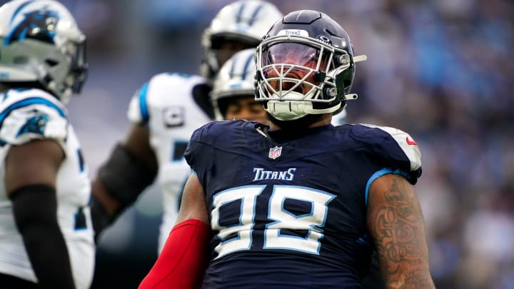 Tennessee Titans defensive tackle Jeffery Simmons (98) celebrates sacking Carolina Panthers quarterback Bryce Young during the third quarter at Nissan Stadium in Nashville, Tenn., Sunday, Nov. 26, 2023.