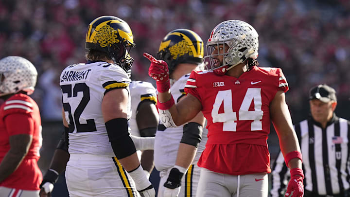 Nov 26, 2022; Columbus, Ohio, USA; Ohio State Buckeyes defensive end J.T. Tuimoloau (44) points out a false start by \m52o\ during the first half of the NCAA football game at Ohio Stadium. Mandatory Credit: Adam Cairns-The Columbus Dispatch
