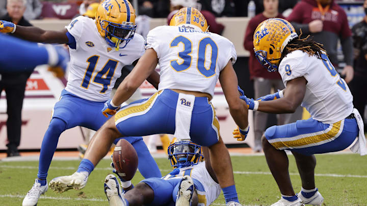 Oct 16, 2021; Blacksburg, Virginia, USA; Pittsburgh Panthers linebacker Bangally Kamara (11) celebrates an interception with teammates defensive back Marquis Williams (14) and linebacker Brandon George (30) and defensive back Brandon Hill (9) during the second quarter against the Virginia Tech Hokiesat Lane Stadium. Mandatory Credit: Reinhold Matay-Imagn Images Oct 16, 2021; Blacksburg, Virginia, USA; Pittsburgh Panthers linebacker Bangally Kamara (11) celebrates an interception with teammates defensive back Marquis Williams (14) and linebacker Brandon George (30) and defensive back Brandon Hill (9) during the second quarter against the Virginia Tech Hokiesat Lane Stadium. Mandatory Credit: Reinhold Matay-Imagn Images