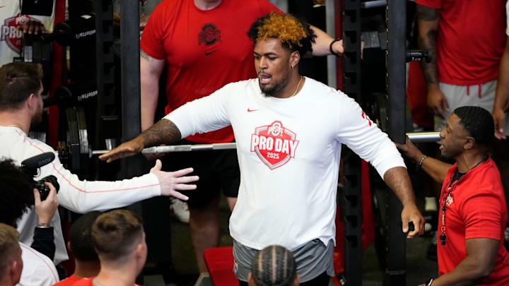 Ohio State Buckeyes offensive lineman Josh Simmons gets high fives after lifting during the pro day for NFL scouts at the Woody Hayes Athletic Cente on March 26, 2025. Ohio State Buckeyes offensive lineman Josh Simmons gets high fives after lifting during the pro day for NFL scouts at the Woody Hayes Athletic Cente on March 26, 2025.