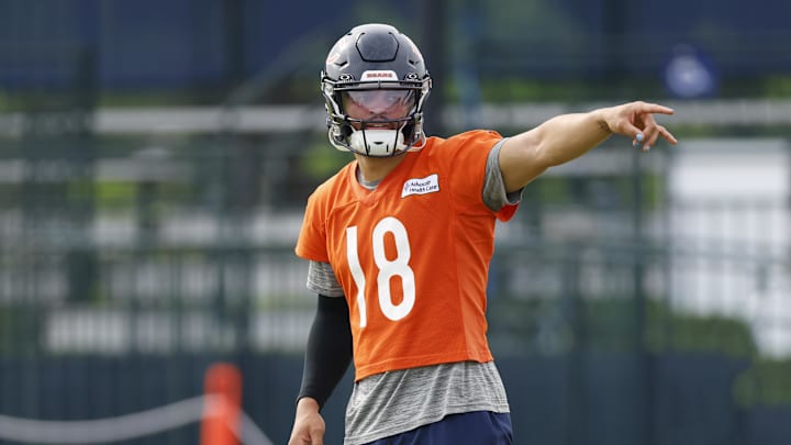 Jul 24, 2025; Lake Forest, IL, USA; Chicago Bears quarterback Caleb Williams (18) signals during training camp at Halas Hall. Mandatory Credit: Kamil Krzaczynski-Imagn Images Jul 24, 2025; Lake Forest, IL, USA; Chicago Bears quarterback Caleb Williams (18) signals during training camp at Halas Hall. Mandatory Credit: Kamil Krzaczynski-Imagn Images
