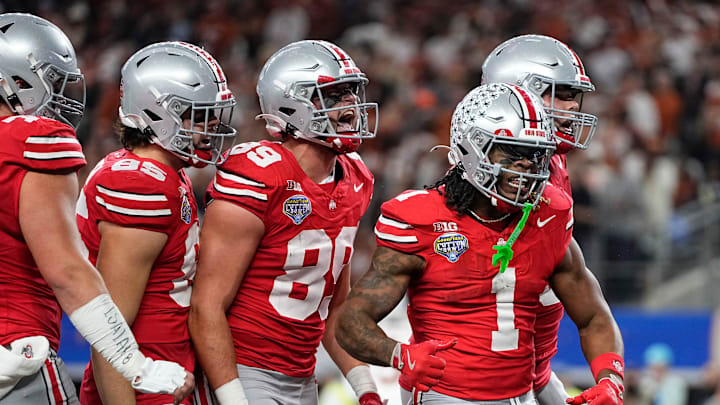 Teammates celebrate a touchdown by Ohio State Buckeyes running back Quinshon Judkins (1) during the first half of the Cotton Bowl Classic College Football Playoff semifinal game against the Texas Longhorns at AT&T Stadium in Arlington, Texas on Jan. 10, 2025.