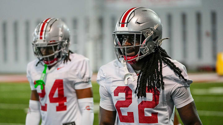 Mar 5, 2024; Columbus, OH, USA; Ohio State Buckeyes cornerback Calvin Simpson-Hunt (22) runs through drills during the first spring practice at the Woody Hayes Athletic Center.