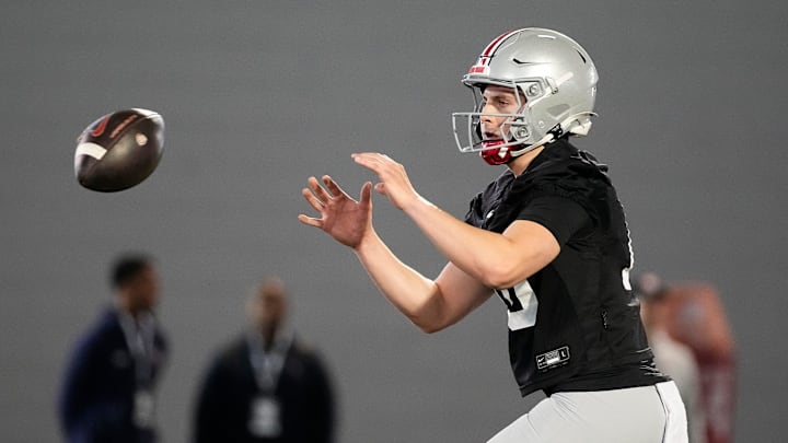 Ohio State Buckeyes quarterback Julian Sayin (10) takes a snap during spring football practice at the Woody Hayes Athletic Center on March 17, 2025.