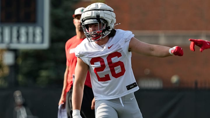 Aug 1, 2024; Columbus, OH, USA; Ohio State Buckeyes linebacker Payton Pierce (26) lines up during football camp at the Woody Hayes Athletic Complex.