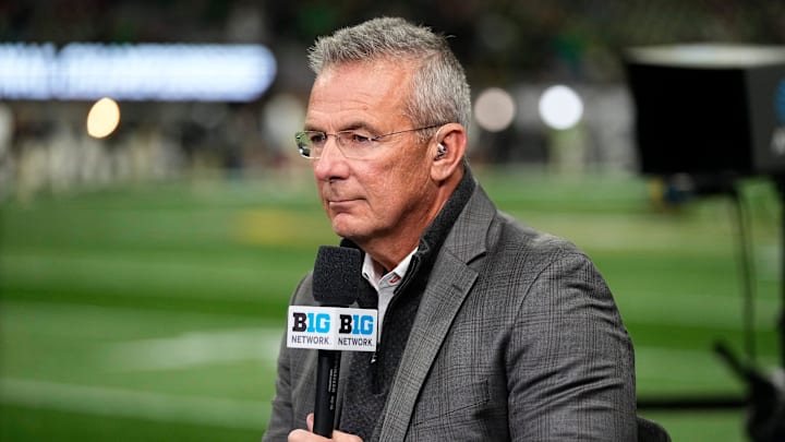 Former Ohio State Buckeyes head coach Urban Meyer broadcasts for the Big Ten Network prior to the College Football Playoff National Championship against the Notre Dame Fighting Irish at Mercedes-Benz Stadium in Atlanta on Jan. 20, 2025.