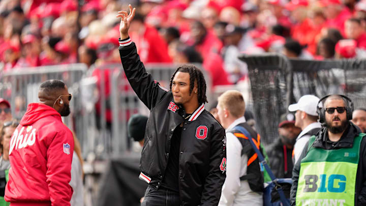 Oct 21, 2023; Columbus, Ohio, USA; Houston Texans quarterback CJ Stroud waves to fans during the NCAA football game between the Ohio State Buckeyes and the Penn State Nittany Lions at Ohio Stadium.