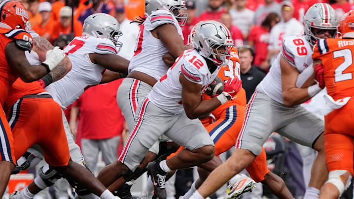 Ohio State Buckeyes running back CJ Donaldson Jr. (12) runs during the second half of the NCAA football game against the Illinois Fighting Illini at Gies Memorial Stadium in Champaign on Oct. 11, 2025. Ohio State won 34-16. Ohio State Buckeyes running back CJ Donaldson Jr. (12) runs during the second half of the NCAA football game against the Illinois Fighting Illini at Gies Memorial Stadium in Champaign on Oct. 11, 2025. Ohio State won 34-16.