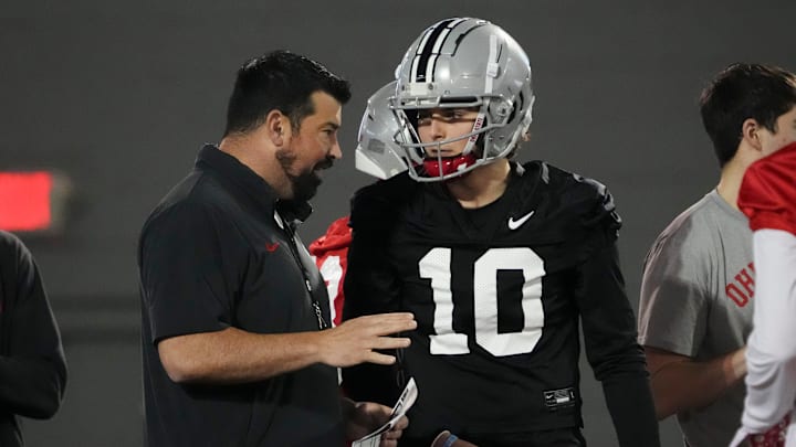 Mar 7, 2024; Columbus, OH, USA; Ohio State Buckeyes head coach Ryan Day talks to quarterback Julian Sayin (10) during spring football practice at the Woody Hayes Athletic Center. Mar 7, 2024; Columbus, OH, USA; Ohio State Buckeyes head coach Ryan Day talks to quarterback Julian Sayin (10) during spring football practice at the Woody Hayes Athletic Center.