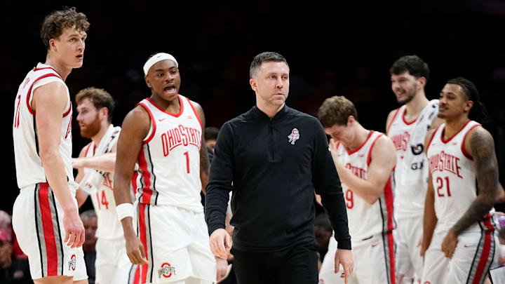 Ohio State Buckeyes head coach Jake Diebler gathers his team for a timeout during the NCAA preseason exhibition game against the Ohio Bobcats at Value City Arena in Columbus on Oct. 26, 2025. Ohio State won 103-74.