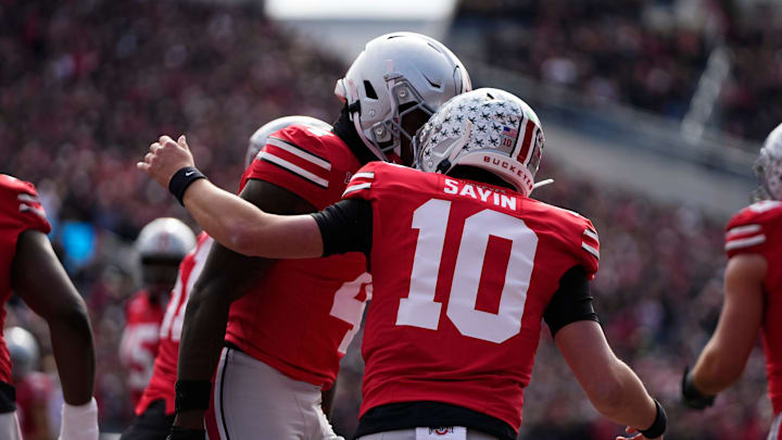 Ohio State Buckeyes wide receiver Jeremiah Smith (4) celebrates a touchdown with quarterback Julian Sayin (10) during the NCAA football game against the Penn State Nittany Lions at Ohio Stadium in Columbus on Nov. 1, 2025.
