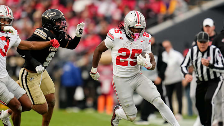 Ohio State Buckeyes running back Bo Jackson (25) runs past Purdue Boilermakers defensive back Myles Slusher (9) during the NCAA football game at Ross-Ade Stadium in West Lafayette, Ind. on Nov. 8, 2025. Ohio State won 34-10. Ohio State Buckeyes running back Bo Jackson (25) runs past Purdue Boilermakers defensive back Myles Slusher (9) during the NCAA football game at Ross-Ade Stadium in West Lafayette, Ind. on Nov. 8, 2025. Ohio State won 34-10.