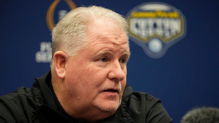 Ohio State Buckeyes offensive coordinator Chip Kelly talks to media shortly after the team arrived in Dallas for the College Football Playoff semifinal at the Cotton Bowl on Jan. 8, 2025.