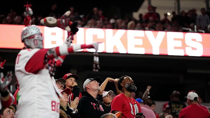 Ohio State Buckeyes fans watch during the Cotton Bowl at AT&T Stadium in Arlington, Texas for the College Football Playoff quarterfinal game against the Miami Hurricanes on Dec. 31, 2025. Ohio State lost 24-14.