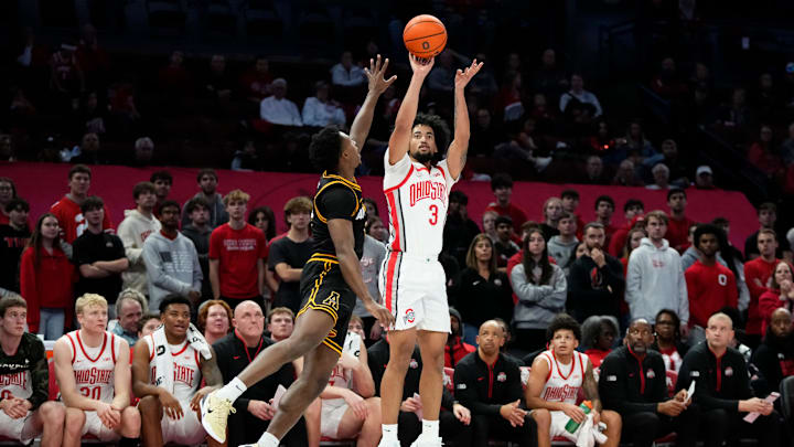 Ohio State Buckeyes guard Taison Chatman (3) shoots a three pointer over Appalachian State Mountaineers guard Eren Banks (4) during the NCAA men's basketball game at Value City Arena in Columbus on Nov. 11, 2025. Ohio State won 75-53.
