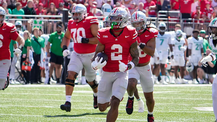Ohio State receiver Emeka Egbuka runs for a touchdown against Marshall.