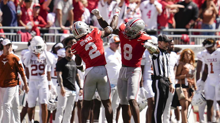 Ohio State Buckeyes safety Caleb Downs (2) and linebacker Arvell Reese (8) celebrate during the NCAA football game against the Texas Longhorns at Ohio Stadium on Aug. 30, 2025.