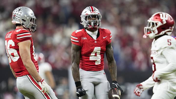 Ohio State Buckeyes wide receiver Jeremiah Smith (4) celebrates a catch during the first half of the Big Ten Conference championship game against the Indiana Hoosiers at Lucas Oil Stadium in Indianapolis on Dec. 6, 2025.