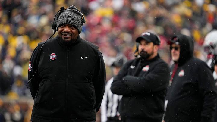 Ohio State Buckeyes defensive line coach Larry Johnson watches during the NCAA football game against the Michigan Wolverines at Michigan Stadium in Ann Arbor, Mich. on Nov. 29, 2025. Ohio State won 27-9. Ohio State Buckeyes defensive line coach Larry Johnson watches during the NCAA football game against the Michigan Wolverines at Michigan Stadium in Ann Arbor, Mich. on Nov. 29, 2025. Ohio State won 27-9.