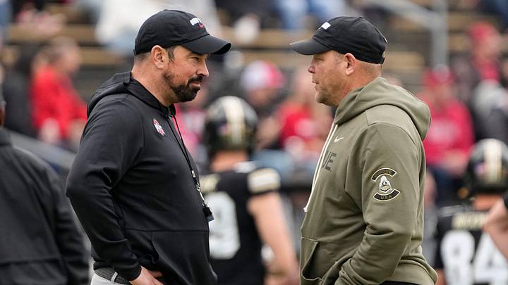 Ohio State Buckeyes head coach Ryan Day talks to Purdue Boilermakers head coach Barry Odom prior to the NCAA football game against the Purdue Boilermakers at Ross-Ade Stadium in West Lafayette, Ind. on Nov. 8, 2025. Ohio State Buckeyes head coach Ryan Day talks to Purdue Boilermakers head coach Barry Odom prior to the NCAA football game against the Purdue Boilermakers at Ross-Ade Stadium in West Lafayette, Ind. on Nov. 8, 2025.