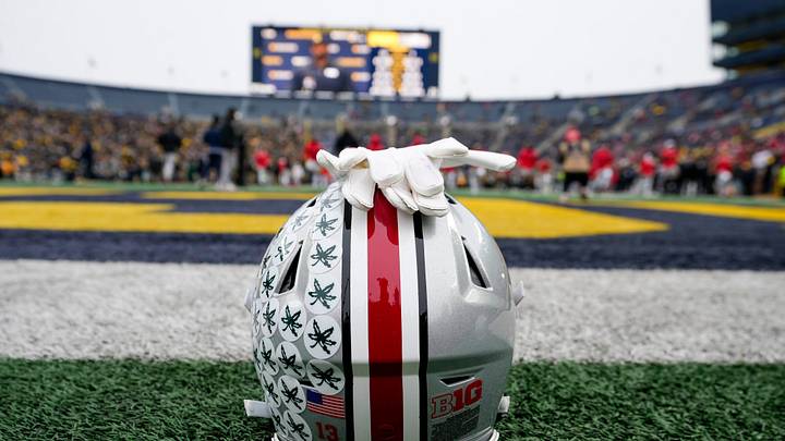 An Ohio State Buckeyes helmet sits behind the endzone as the team warms up for its game against the Michigan Wolverines during the NCAA football game at Michigan Stadium in Ann Arbor, Mich. on Nov. 29, 2025. Ohio State won 27-9.