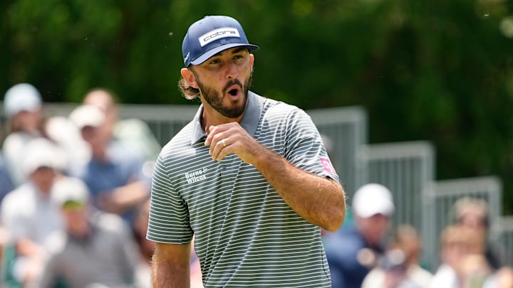 Max Homa reacts to a missed birdie putt on the eighth green.