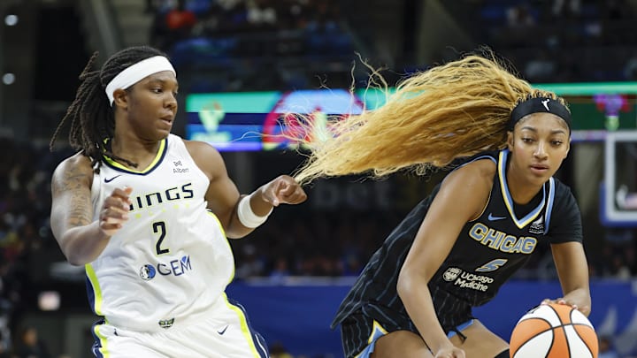 Dallas Wings forward Myisha Hines-Allen defends against Chicago Sky forward Angel Reese.