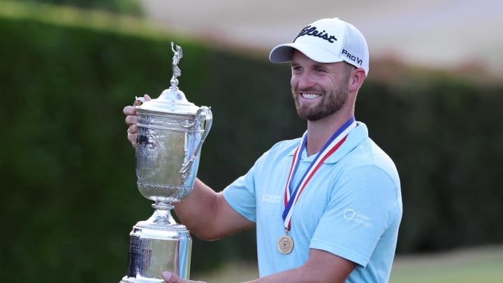 Jun 18, 2023; Los Angeles, California, USA; Wyndham Clark celebrates with the championship trophy after winning the U.S. Open golf tournament at Los Angeles Country Club. Mandatory Credit: Kiyoshi Mio-USA TODAY Sports