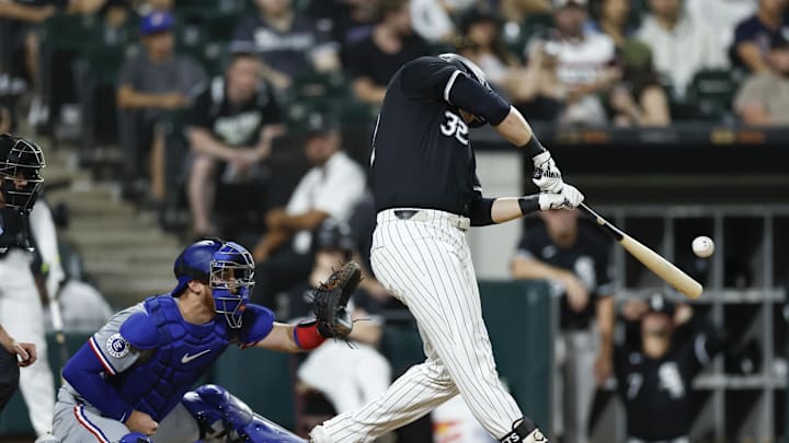 Chicago White Sox outfielder Gavin Sheets (32) hits a single against the Texas Rangers during the third inning of game two of the doubleheader at Guaranteed Rate Field in 2024.