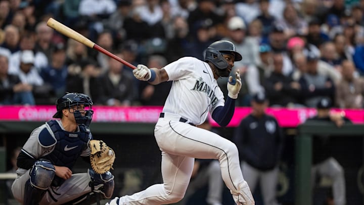 Seattle Mariners designated hitter Taylor Trammell (5) takes a swing during an at-bat against the New York Yankees at T-Mobile Park in 2023.