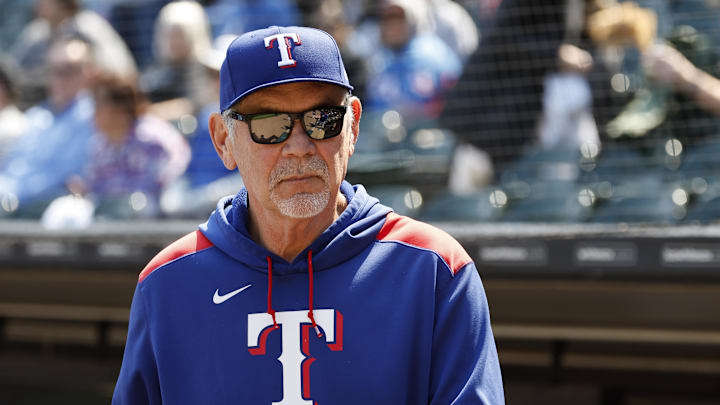 Texas Rangers manager Bruce Bochy (15) looks on from the dugout before a baseball game against the Chicago White Sox at Rate Field in 2024.