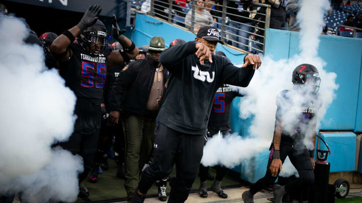 Tennessee State head coach Eddie George leads his team to the field to face Norfolk State in the TSU homecoming game at Nissan Stadium in Nashville, Tenn., Saturday, Oct. 14, 2023. Tennessee State head coach Eddie George leads his team to the field to face Norfolk State in the TSU homecoming game at Nissan Stadium in Nashville, Tenn., Saturday, Oct. 14, 2023.