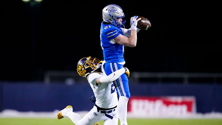 Olentangy Liberty's Jake Struck (21) catches a pass against Moeller in the first half of the Division I state championship game at Tom Benson Hall of Fame Stadium on Friday, Dec. 6, 2024, in Canton, Ohio. Olentangy Liberty's Jake Struck (21) catches a pass against Moeller in the first half of the Division I state championship game at Tom Benson Hall of Fame Stadium on Friday, Dec. 6, 2024, in Canton, Ohio.